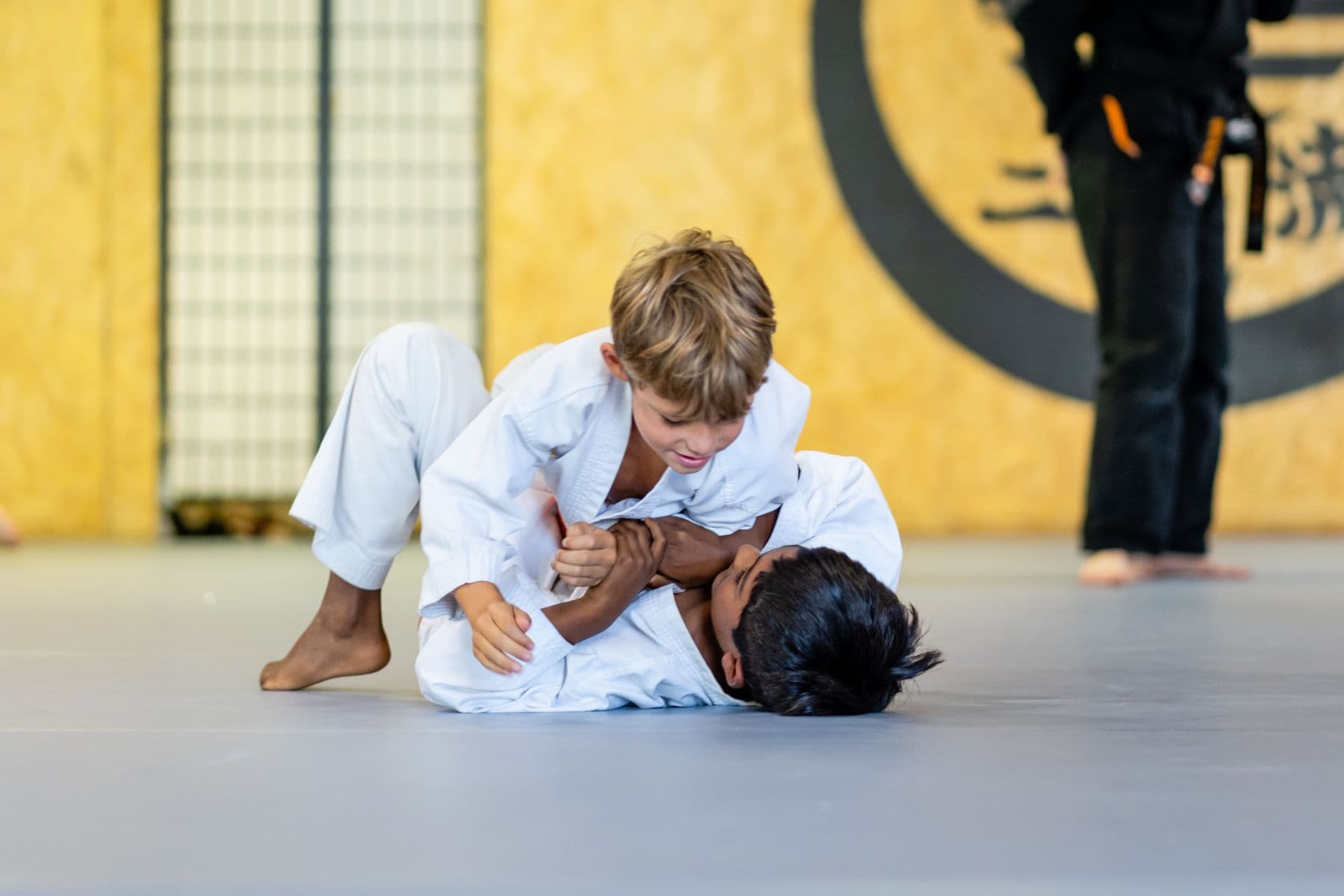 Kids grappling at PMA